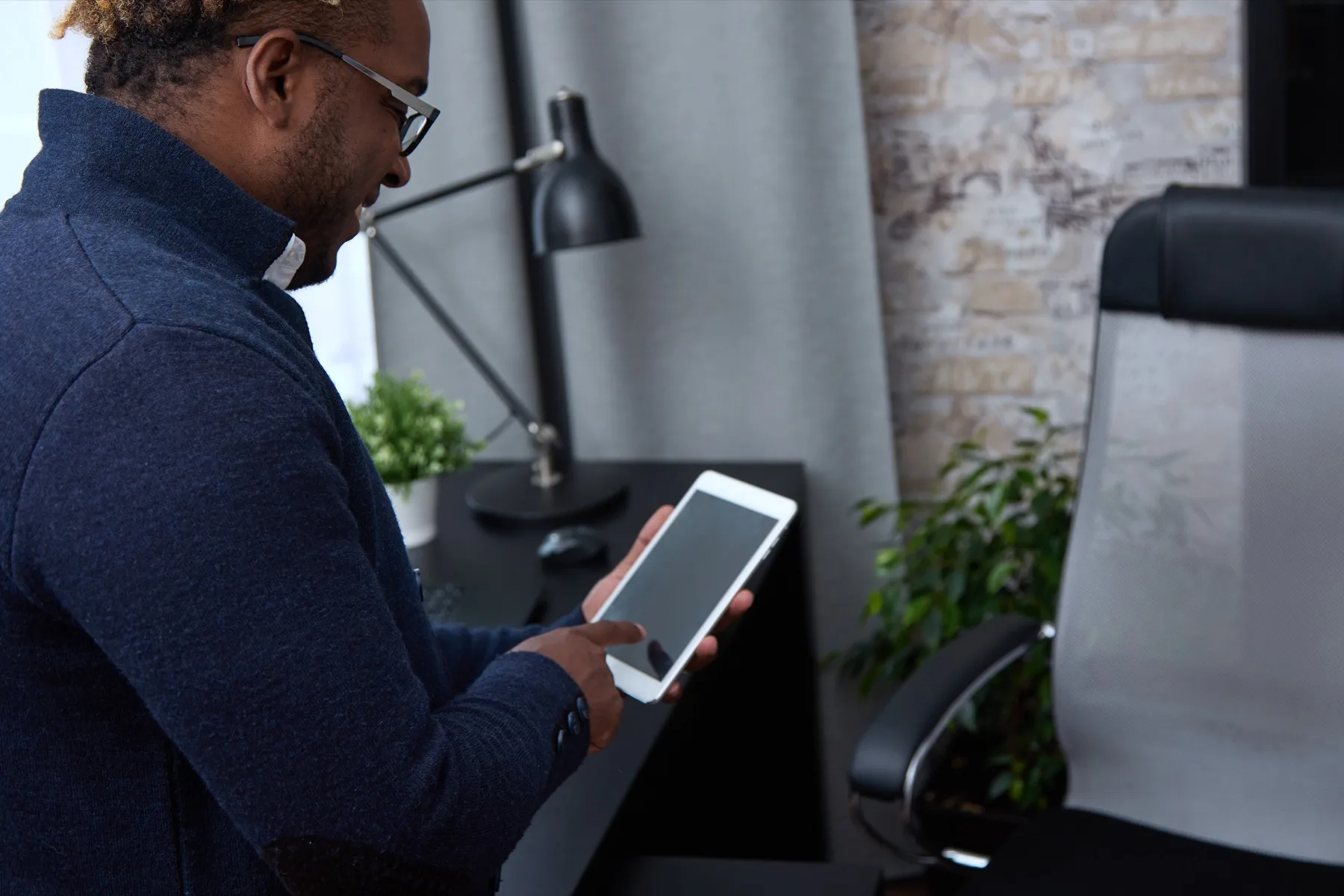 African office user completing biometric fingerprint enrollment