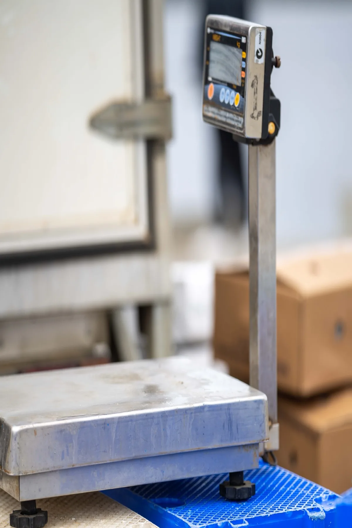 Industrial scale used for weighing goods in a working production environment