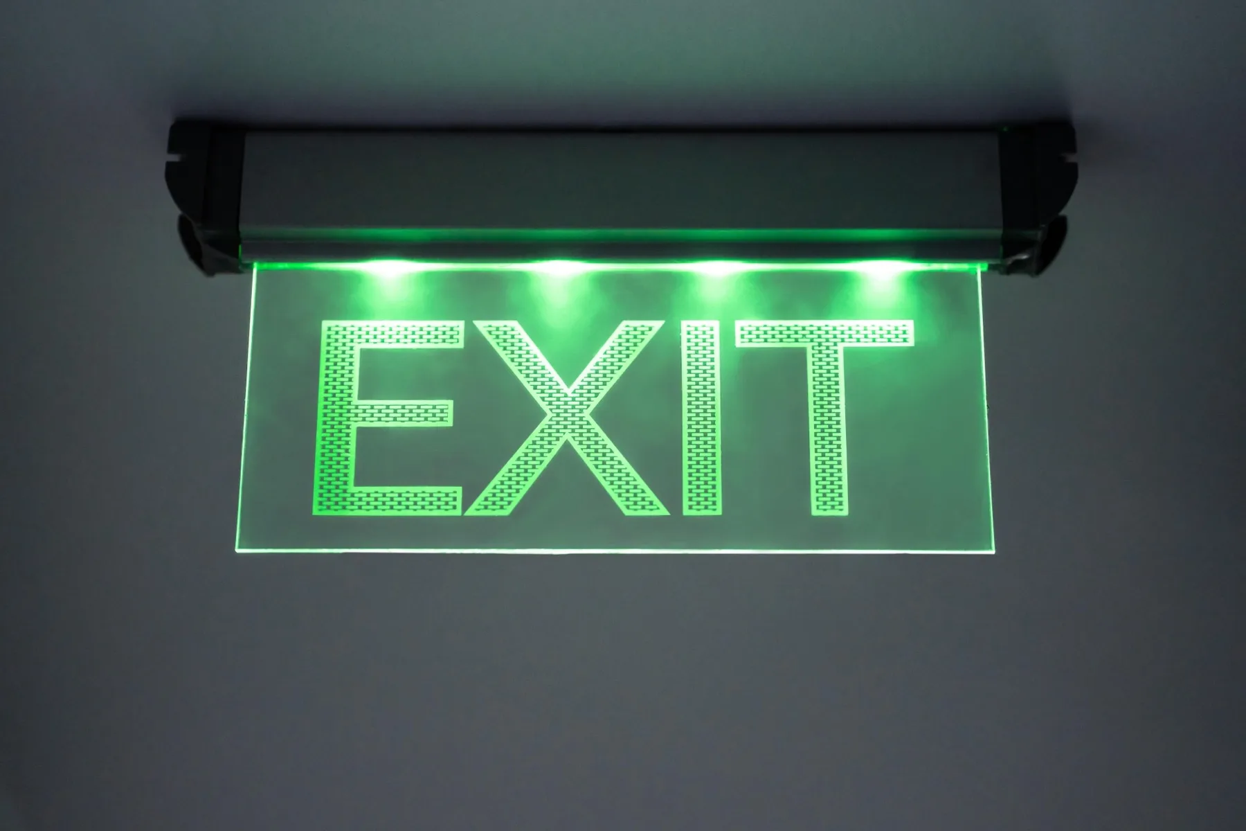 Emergency exit lighting in an industrial corridor